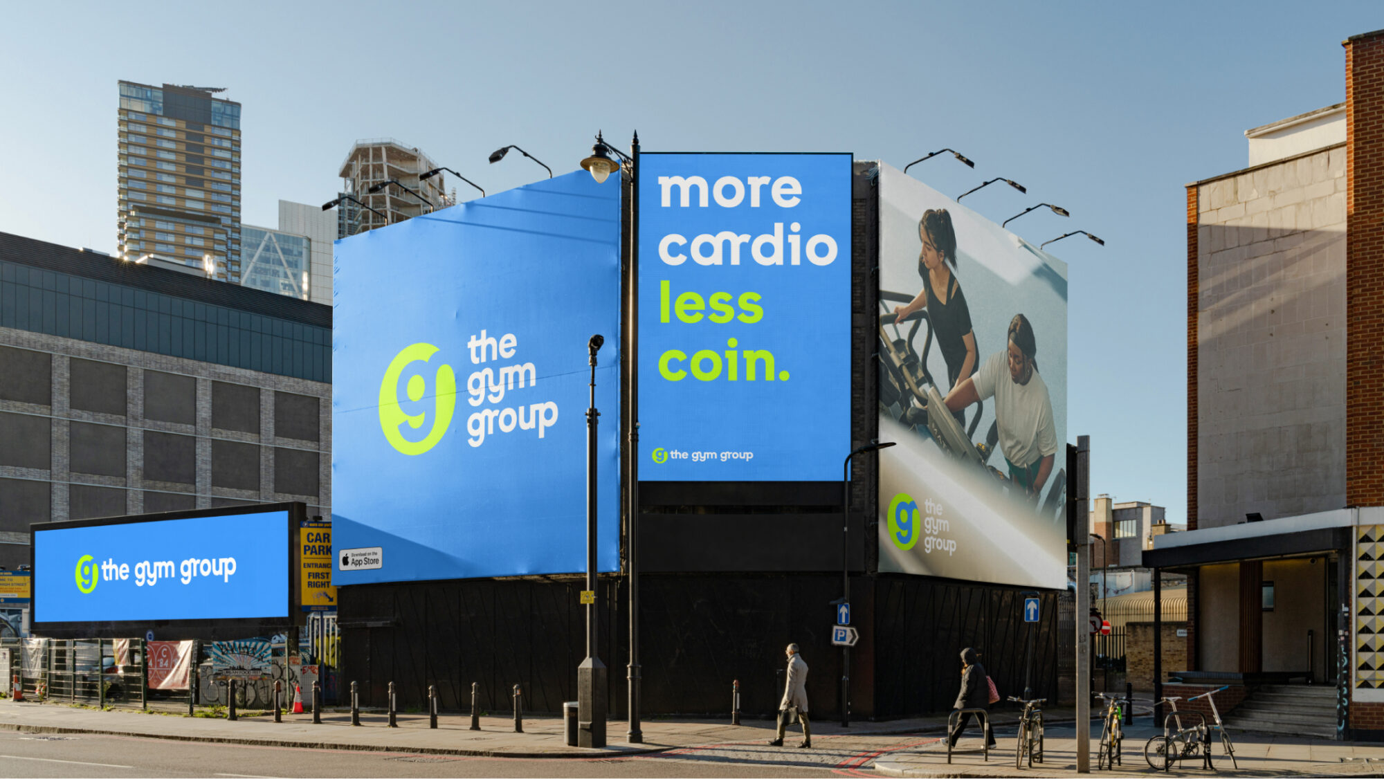 A large blue Gym Group billboard with the title 