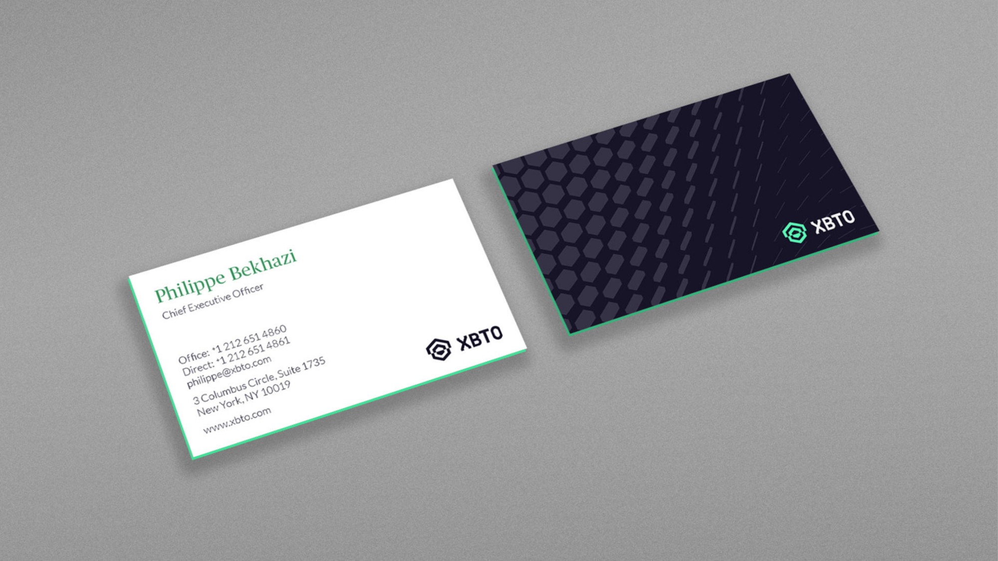 The new logo on two business cards.